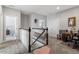 Upstairs landing area with view to a sitting area and home office at 468 Talons Rest Way, Cary, NC 27513