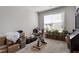 Bright spare room ready for personalization with natural light from large windows at 468 Talons Rest Way, Cary, NC 27513
