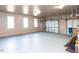 Spacious garage interior featuring ample storage space and room for multiple vehicles at 4704 Upchurch Ln, Wake Forest, NC 27587