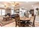Open-concept living area showcases a blend of living room, dining area, and modern kitchen at 4704 Upchurch Ln, Wake Forest, NC 27587