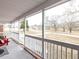 Relaxing covered porch with white railing and a view of the front yard at 4704 Upchurch Ln, Wake Forest, NC 27587