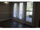 Cozy dining area featuring a door that leads to the beautiful outdoor deck area at 500 Woodcroft Pkwy # 16D, Durham, NC 27713