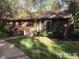 Charming single-story brick home with a chimney and a well-manicured front yard at 500 Woodcroft Pkwy # 16D, Durham, NC 27713