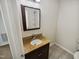This modern bathroom features tile floors, updated vanity and lighting at 5614 Greenbay Dr, Durham, NC 27712