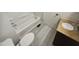 Bright bathroom with a bathtub, tile floors, modern vanity and updated fixtures at 5614 Greenbay Dr, Durham, NC 27712