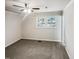Bedroom with a ceiling fan with light, carpet and large window at 5614 Greenbay Dr, Durham, NC 27712