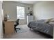 Bedroom with a single bed, a desk, and a dresser at 704 Mirror Pond Dr, Zebulon, NC 27597