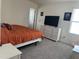 Bedroom with a bed, a dresser, and a window at 704 Mirror Pond Dr, Zebulon, NC 27597
