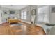 Bright bedroom features hardwood floors, large windows, and a tranquil ambiance at 709 North St, Durham, NC 27701