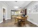 Bright dining room showcasing hardwood floors, modern lighting, and natural light at 709 North St, Durham, NC 27701