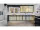 Bright kitchen featuring wood-style floors, stainless steel appliances, and ample cabinet space at 709 North St, Durham, NC 27701