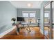Office boasts beautiful wood floors, large windows, and a functional workspace at 709 North St, Durham, NC 27701