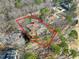 An aerial view showing the property boundaries and surrounding mature trees at 103 Bruce Dr, Cary, NC 27511
