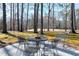 Inviting backyard patio features a dining table and chairs, creating an ideal outdoor entertaining space at 103 Bruce Dr, Cary, NC 27511