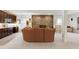 Cozy basement with a stone fireplace, carpet floors, a wet bar, and a comfortable sofa at 103 Bruce Dr, Cary, NC 27511