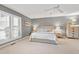 Primary bedroom with neutral decor, a large window, and well-coordinated furnishings at 103 Bruce Dr, Cary, NC 27511