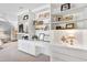 Bedroom featuring custom built-in shelving, drawers, and a desk area for organization at 103 Bruce Dr, Cary, NC 27511