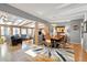 Open-concept living and dining area with hardwood floors and neutral wall colors at 103 Bruce Dr, Cary, NC 27511