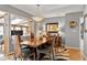 Dining room featuring gray walls, hardwood flooring and large windows at 103 Bruce Dr, Cary, NC 27511