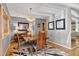 Elegant dining room with a modern light fixture and a decorative mirror at 103 Bruce Dr, Cary, NC 27511