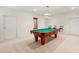 Bright game room featuring a billiard table, chairs, and recessed lighting at 103 Bruce Dr, Cary, NC 27511