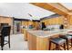 Kitchen with granite countertops, wood paneling, and stainless steel appliances at 103 Bruce Dr, Cary, NC 27511