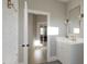 Stylish bathroom showcasing a vanity with a white countertop and elegant gold fixtures at 1104 Tobacco Row Ct, Zebulon, NC 27597