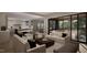 Spacious living room showcasing an open layout with views of the kitchen and outdoor area at 1104 Tobacco Row Ct, Zebulon, NC 27597