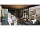 Outdoor patio with comfortable seating, a fireplace, and a view of the surrounding landscape at 1104 Tobacco Row Ct, Zebulon, NC 27597