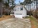 Charming two-story home with a two-car garage and well-maintained lawn at 11308 Leesville Rd, Raleigh, NC 27613