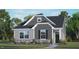 Charming home with gray siding, stone accents, and a well-manicured lawn at 1305 White Verona Way, Knightdale, NC 27545