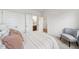 Bedroom with a view of the bathroom and a chair in the corner of the room at 149 Cribbs Ln, Middlesex, NC 27557