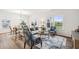 Inviting living room with stylish furniture, a patterned rug, and views of the neighborhood at 149 Cribbs Ln, Middlesex, NC 27557