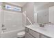 Bathroom featuring a modern sink, vanity and shower-tub combo at 155 Jade St, Smithfield, NC 27577
