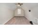 Finished bedroom with ceiling fan, window, and modern gray paint at 155 Jade St, Smithfield, NC 27577