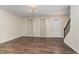 Spacious living room featuring hardwood floors, natural light, and staircase at 155 Jade St, Smithfield, NC 27577