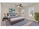 Beautiful main bedroom with a ceiling fan, and a blue accent rug at 155 Jade St, Smithfield, NC 27577