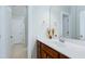 Bathroom featuring a single sink with modern faucet and a large mirror at 1707 Capstone Dr, Durham, NC 27713