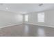 Spacious bedroom with ample natural light, featuring modern floors and neutral paint at 1707 Capstone Dr, Durham, NC 27713
