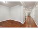 The bright, open living space features gleaming hardwood floors and neutral paint, creating a modern look at 1707 Capstone Dr, Durham, NC 27713