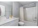 Neat bathroom featuring a single vanity, toilet, and shower-tub combo with curtain at 192 Kensington Dr, Spring Lake, NC 28390