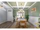 Elegant dining room with coffered ceiling, chandelier, and large window at 192 Kensington Dr, Spring Lake, NC 28390