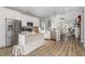 Modern kitchen with white cabinets, stainless steel appliances, granite countertops, and open layout at 192 Kensington Dr, Spring Lake, NC 28390