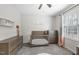 Charming Bedroom with grey wood crib and dresser, adorned with cute 'Charlotte' wall decor at 20 Crane Dr, Louisburg, NC 27549