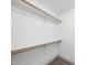 Walk-in closet with rods and shelves, providing ample storage for clothing and accessories at 20 Crane Dr, Louisburg, NC 27549
