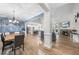 Open concept living area with hardwood floors and fireplace at 20 Crane Dr, Louisburg, NC 27549