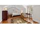 Cozy bedroom featuring natural light, hardwood floors, and a comfortable bed at 2147 Wake Dr, Raleigh, NC 27608