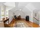Bright bedroom with vaulted ceilings, hardwood floors, and natural light at 2147 Wake Dr, Raleigh, NC 27608