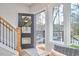 Inviting foyer featuring a front door with glass accents and a seasonal wreath, next to a window at 2704 Ashley St # B, Durham, NC 27704