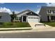 Charming one-story home featuring a two-car garage and a well-manicured front yard at 305 Brickwell Way, Youngsville, NC 27596